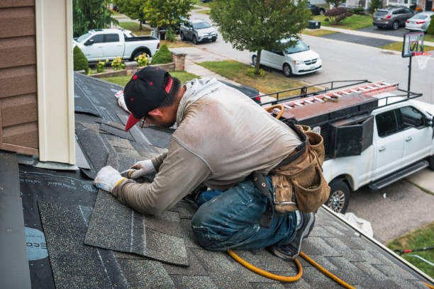 Professional Roofing technician working in Washington, ME